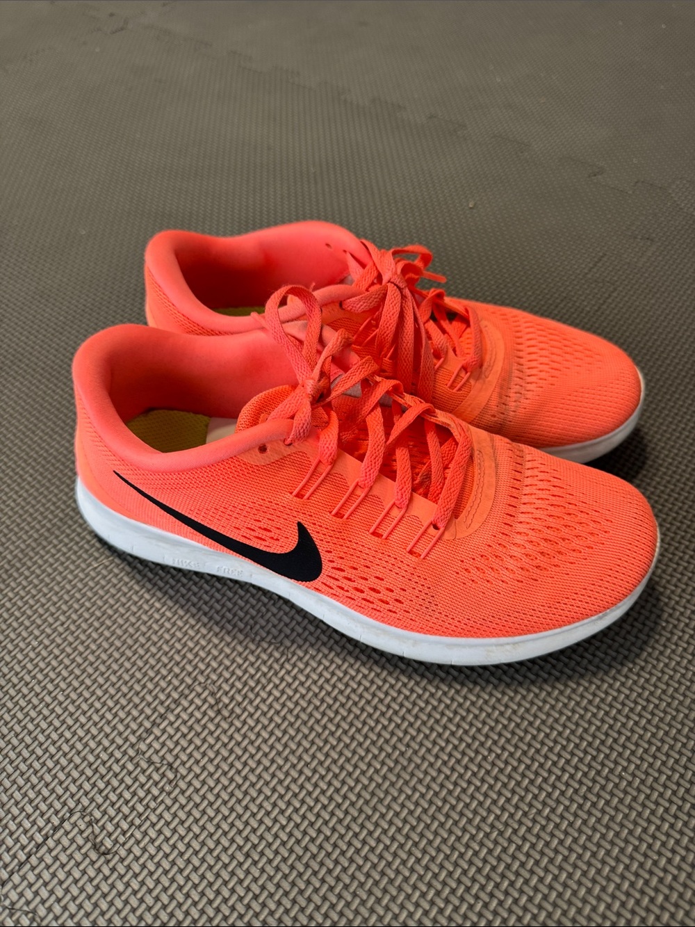 Nike Kids Coral Running Sneakers with Black Swoosh